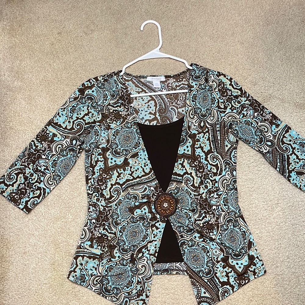 Brown, blue, tan, and white blouse